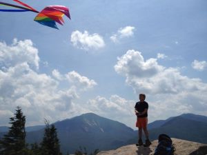 Andy flies kite, from Summit of Noonmark