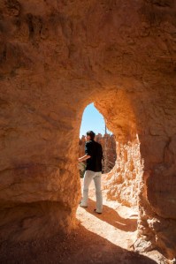 Hiking through Bryce Canyon Amphitheatre often incudes short tunnels through the fins and hoodoos.