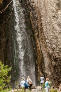 We visit the waterfall at Arusha National Park.