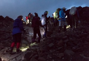 Headlamps on, we begin our summit approach before dawn.