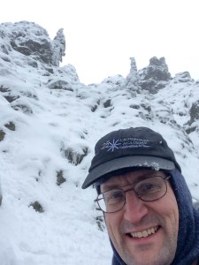 I turn back from the near-vertical gully filled with snow and ice, and lots of exposure.