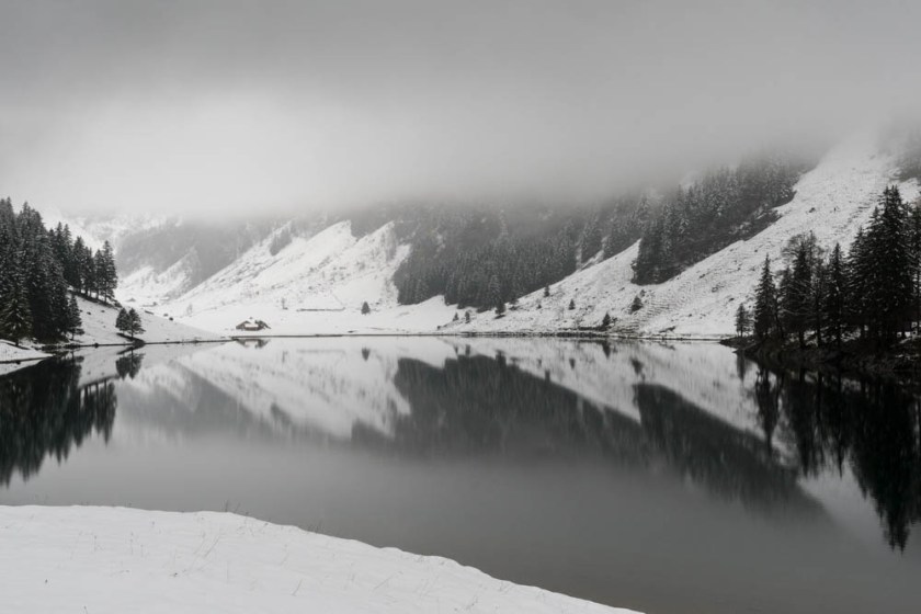 Seealpsee, a pretty glacial tarn in this alpine valley.