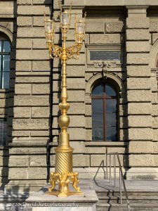 Gold-painted lampposts outside ETH main building.