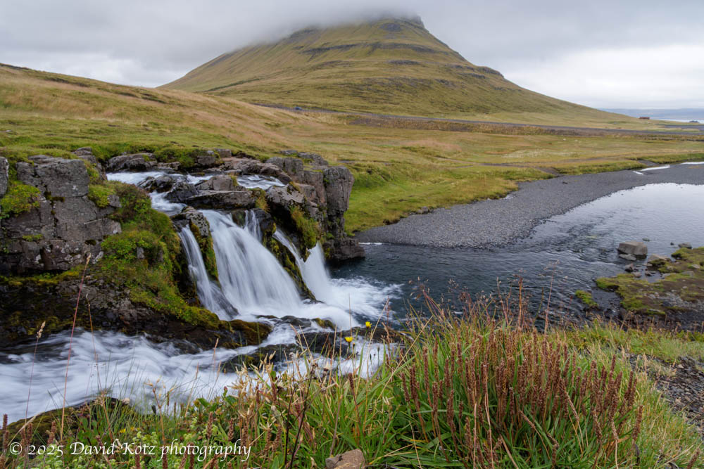 photo of Kirkjufellfoss waterfall and Kirkjufell mountain, Iceland.