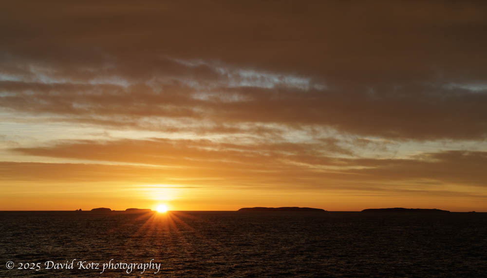 sunrise over the straight between southern New Zealand and Raikura Stewart Island.