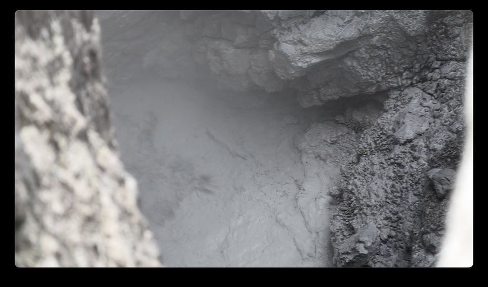 photo of Rua Pūmahu crater, which if clicked will jump to the video version.